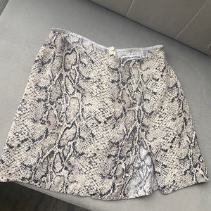 Reformation snake print skirt.